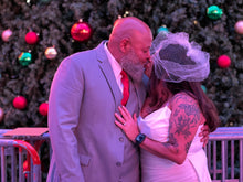 Load image into Gallery viewer, Pkg C1: WEDDING AT THE FREMONT STREET EXPERIENCE
